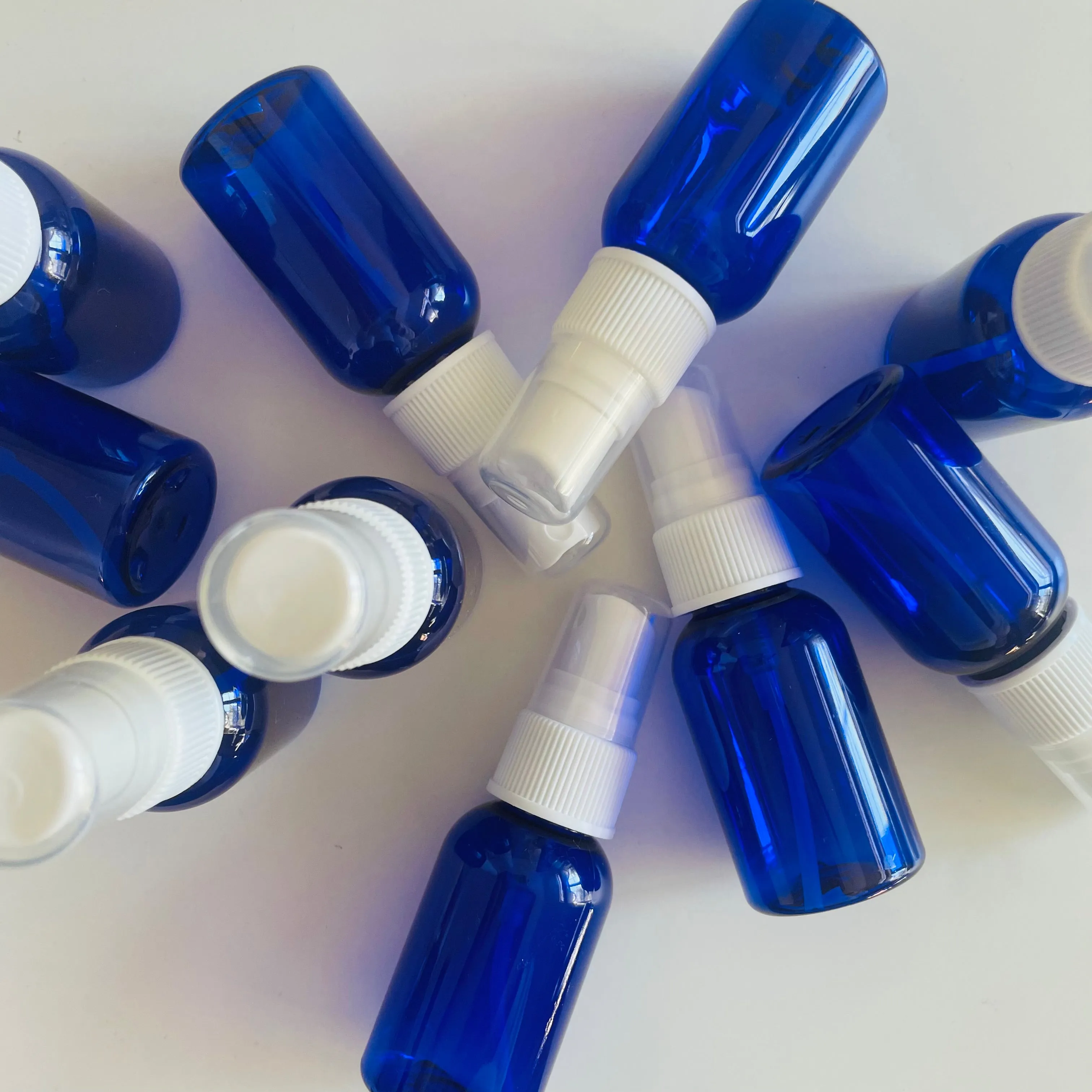 1 oz Refillable Travel Bottle (empty)