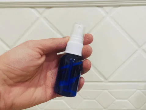 1 oz Refillable Travel Bottle (empty)