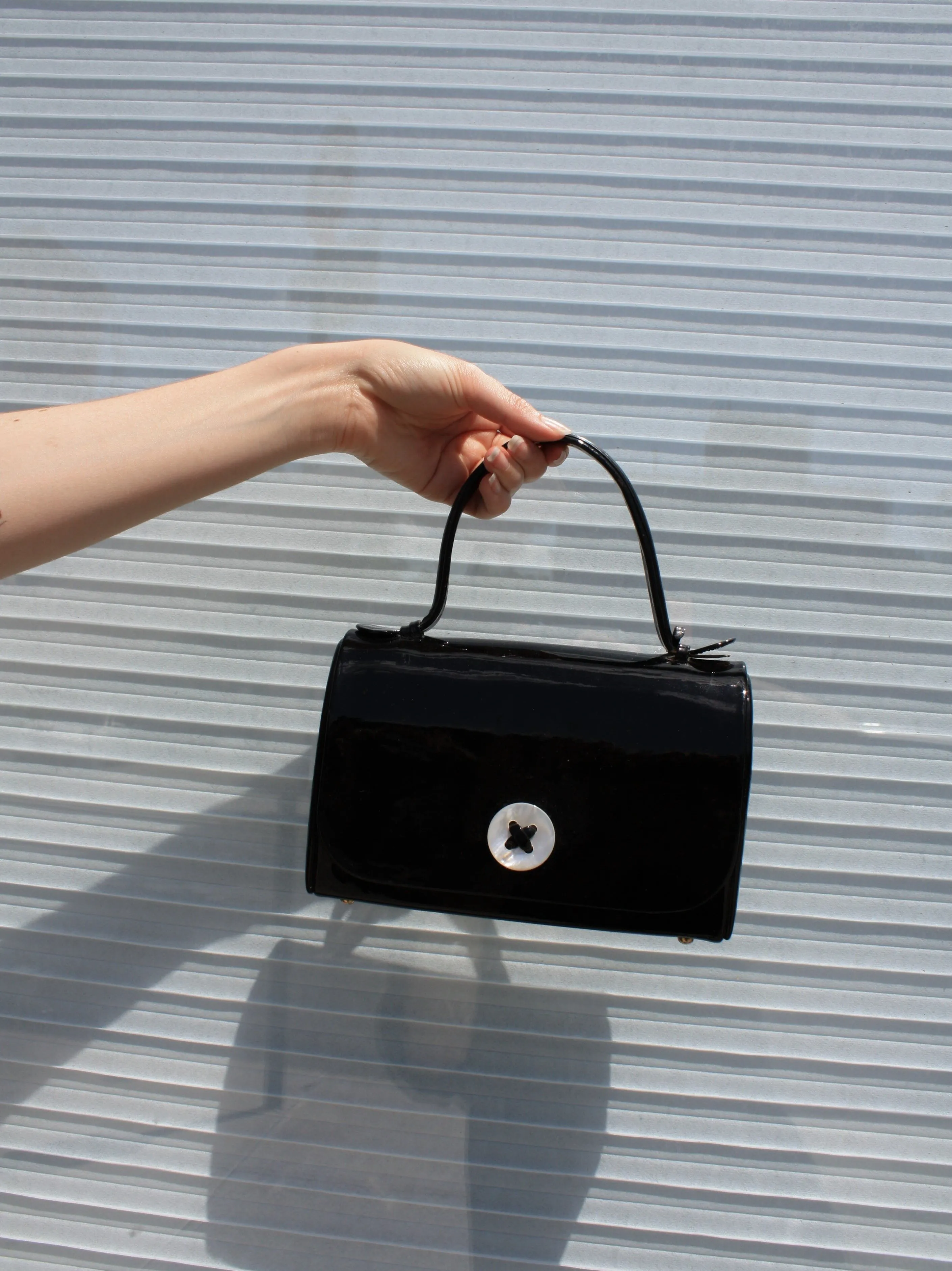 Button Patent Handbag