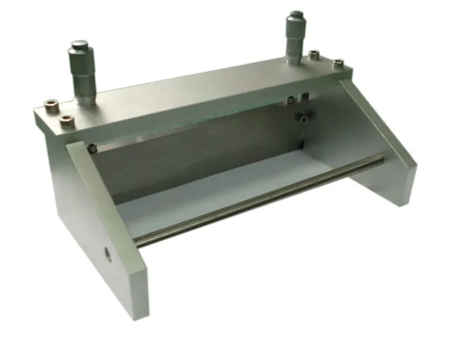 Compact electrode film coating machine with vacuum and heater