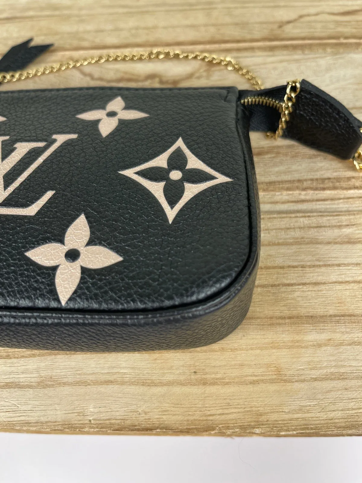 LOUIS VUITTON Empreinte Monogram Giant Mini Pochette Accessories Black Bag