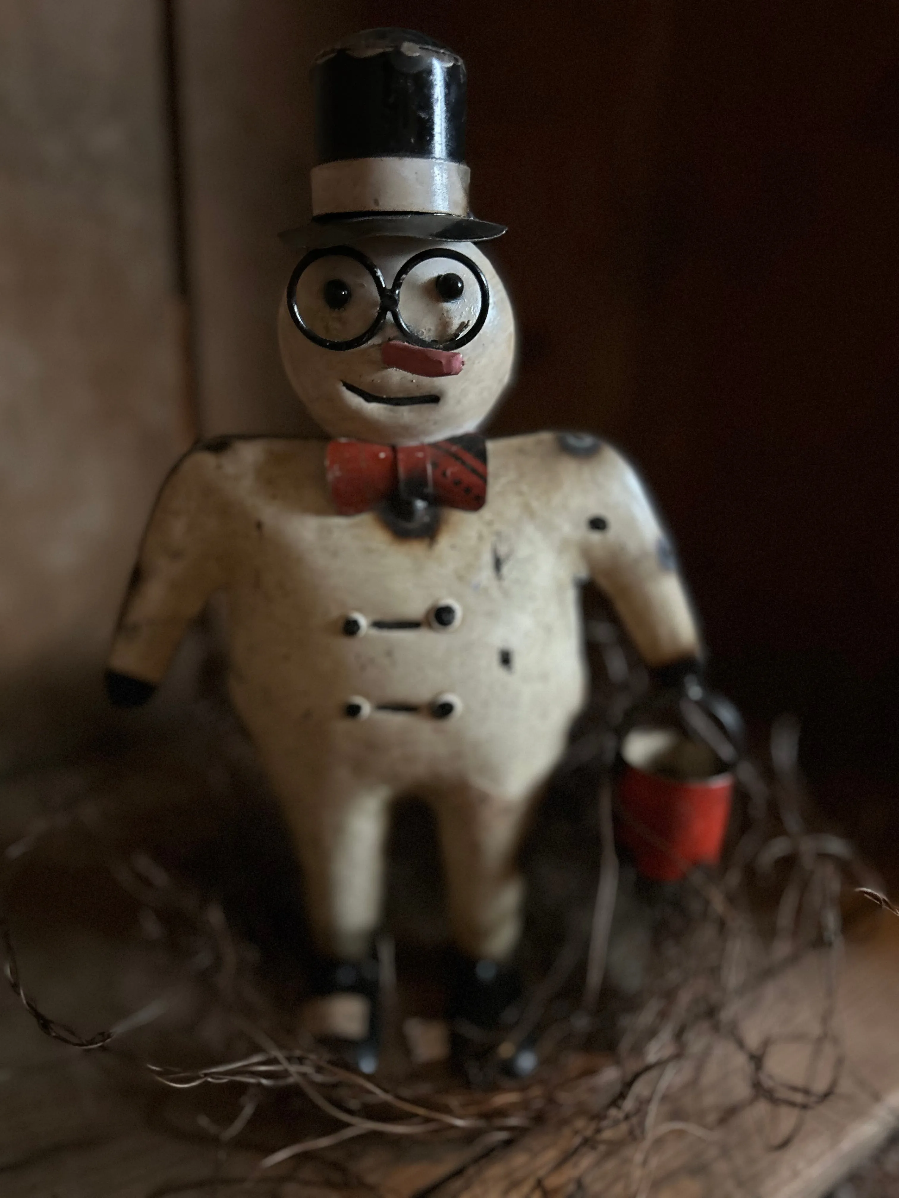 Metal Snowman Holding Bucket
